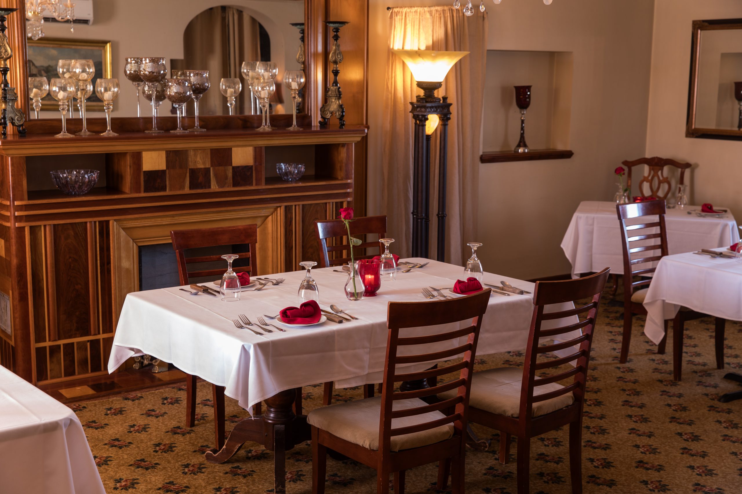 Primrose Living Room dining with tables set